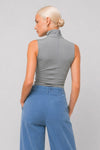Sleeveless high-neck top with a centre front twist - KANDIDO Bodysuit Blouse