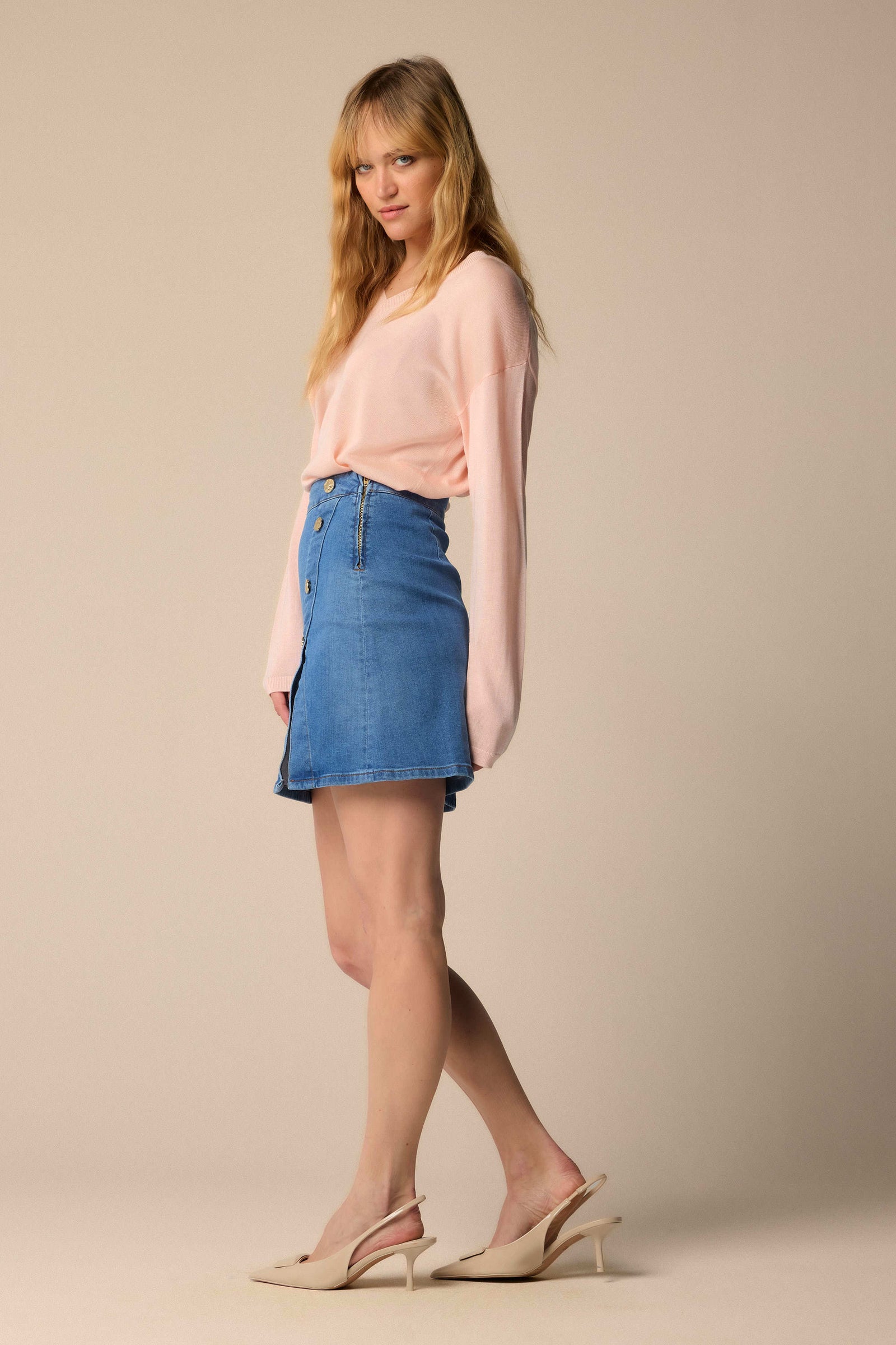Gonna corta in denim con piega a soffietto Gonna corta in denim con piega a soffietto