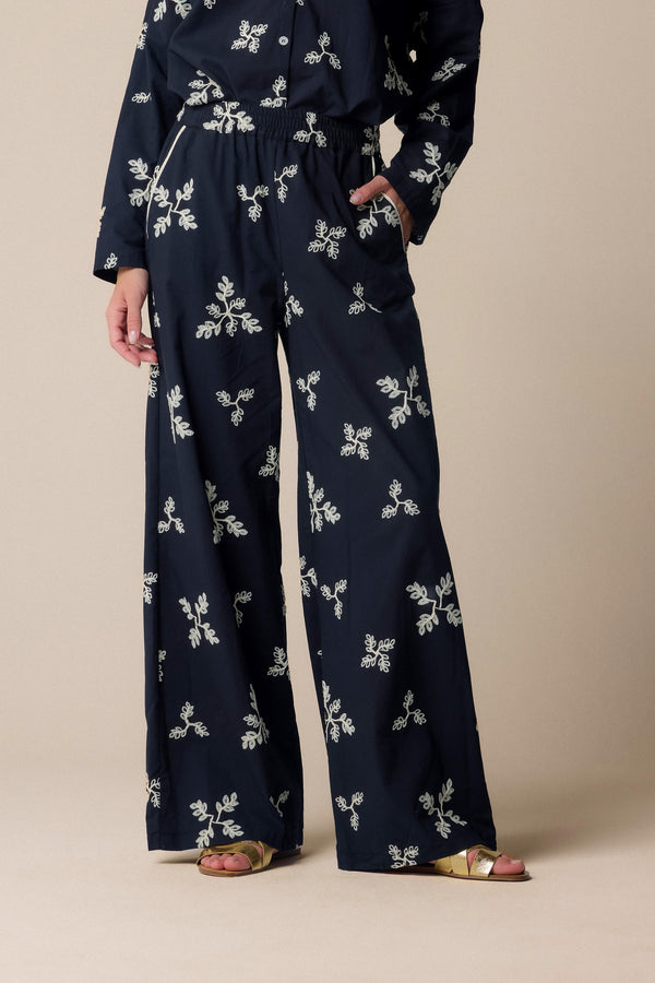 wide-legged patterned black trousers - Trousers HADEWIN