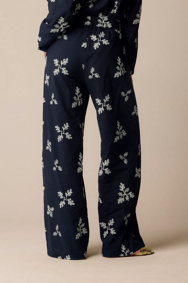 wide-legged patterned black trousers - Trousers HADEWIN