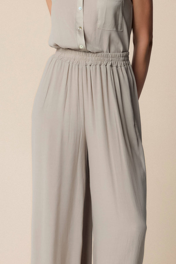 flowing grey trousers with pleated waist detailing - Trousers  ICARO